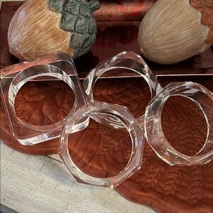 Goddess-size clear bracelets, never worn, asymmetrical in size.